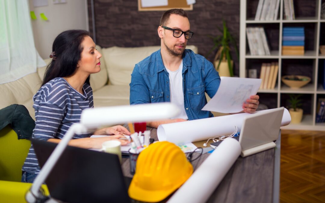 A general contractor and architect having a pre-construction meeting